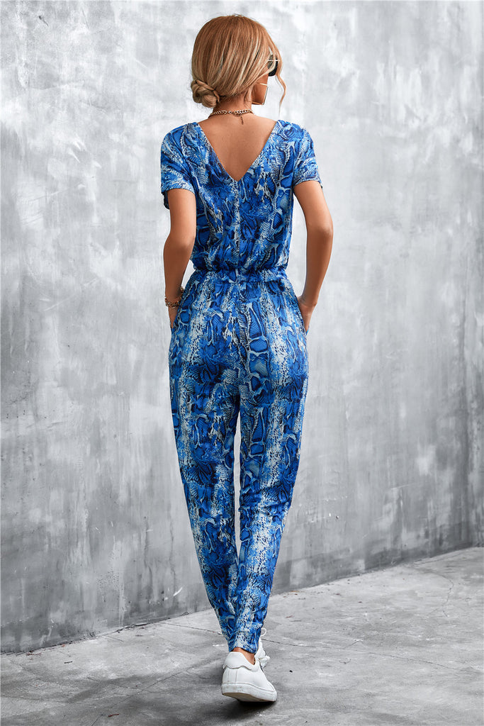 Animal Print V-Neck Jumpsuit with Pockets - Belle Donne Clothing & Accessories