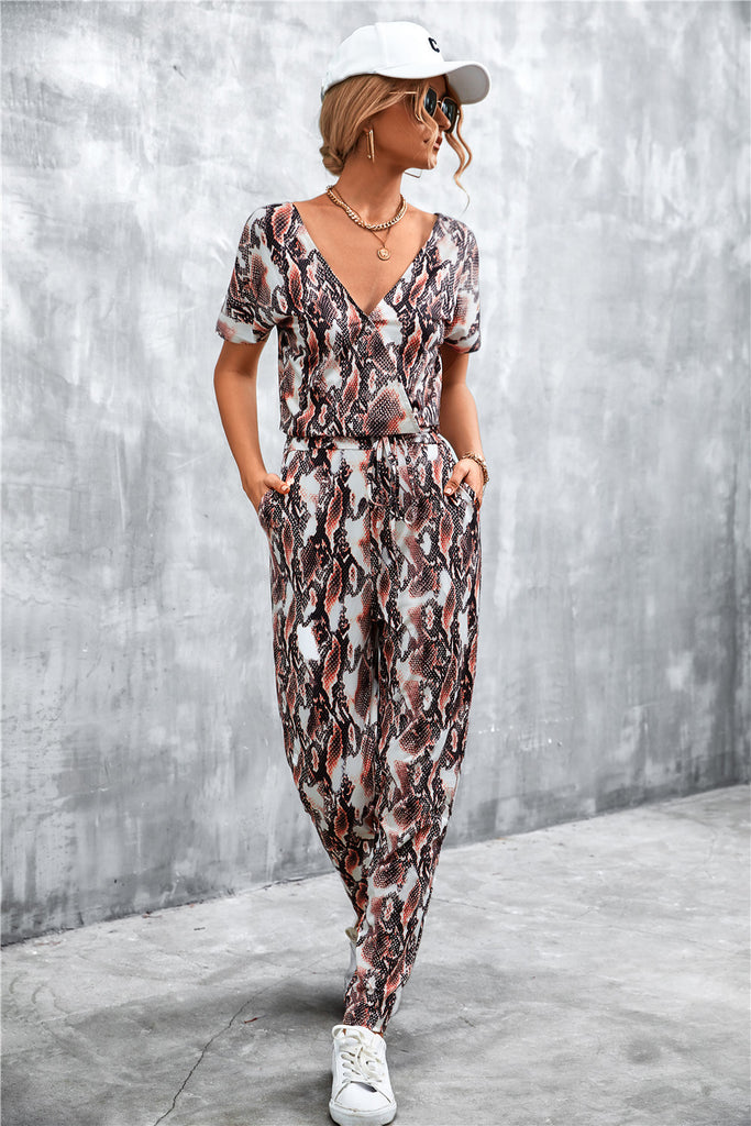 Animal Print V-Neck Jumpsuit with Pockets - Belle Donne Clothing & Accessories